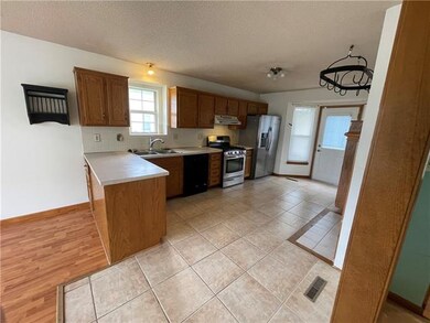 309 W Laredo Trail, Raymore, MO 64083 - photo 4