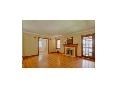Spacious Living Room with Fireplace
