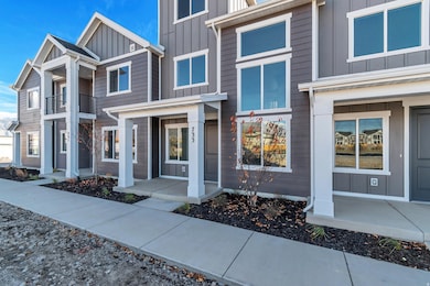 Doorway to property with board and batten siding