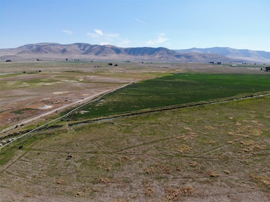 View of rural area with a mountain backdrop