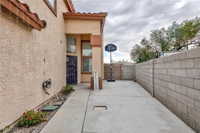 View of patio with a fenced backyard