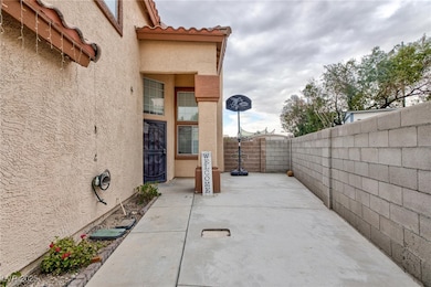 View of patio with a fenced backyard
