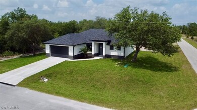 View of front of house with a front lawn