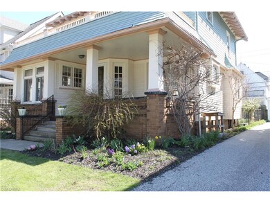 Southwest side of the home.  Lovely perennial beds on this property.