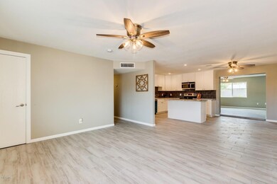 Living room looking into kitchen