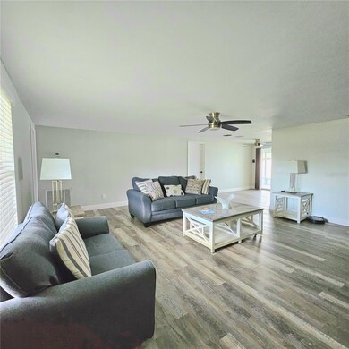 Living room remodeled. Popcorn ceiling removed.