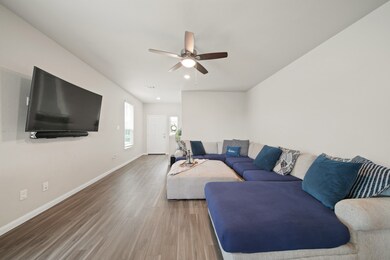 The spacious family room is well designed to accom