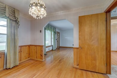 From dining into the front living room, to the right is the kitchen.