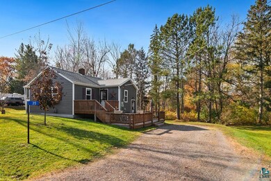 View of front of home featuring a front lawn and a