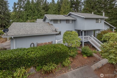 Built in 1980, this well-maintained one-level condo can be accessed by a breezeway to the front door with only one step, or via the stairwell in the photo that leads to the lower parking lot. Live simply so you can live large!