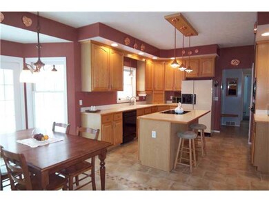 Kitchen New Ceramic Floor, Oak Cabinets, and 