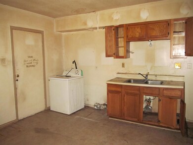 Kitchen featuring sink and washer / clothes dryer