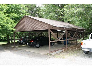 Exterior Front. Detached carport.