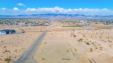 Bird's eye view of a desert landscape and a mounta