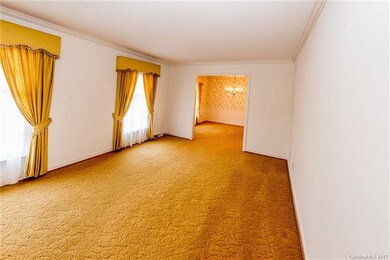 Hardwoods under carpet have been covered and prote