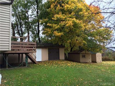 Exterior Back Back Garage and Storage Sheds