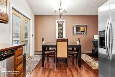 DINING AREA/DOORS TO DECK
