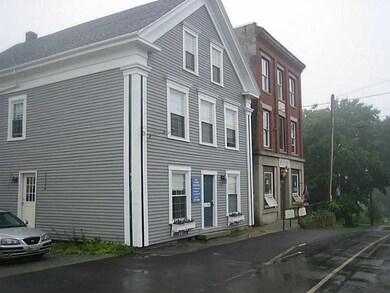 Exterior Front. Town business area...
