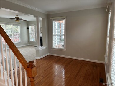 Interior space with decorative columns, ceiling fa