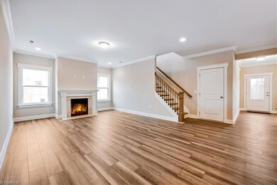 Expansive Great Room with FP and LVP Flooring throughout