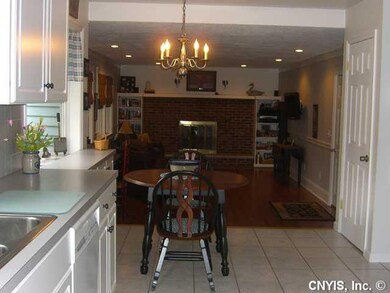 Family Room Kitchen/ Family Room Combo warmed by a