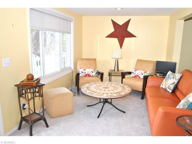 Overlooking the water, the spacious living room ha