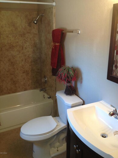 Tiled master bath with new toilet/vanity