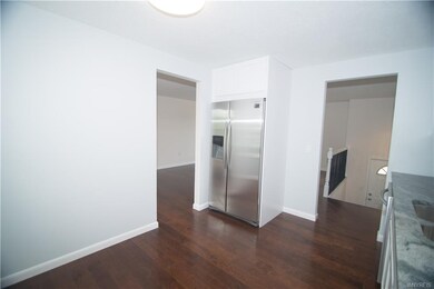 Stainless steel appliances are included.