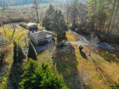 Aerial View, Detached Carport and Detached Cinderblock Storage Bldg