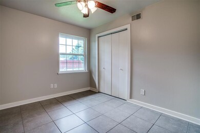 Tile floors and ceiling fans in all bedrooms