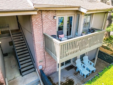 Exterior space featuring brick siding, french door