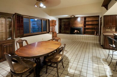 INFORMAL DINING AREA AND FAMILY ROOM