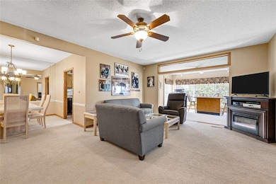 The formal dining room is to the left, living room