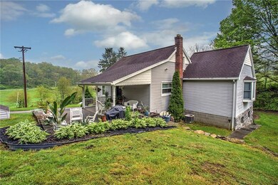 RELAX ON THIS INVITING COVERED FRONT PORCH LOCATED