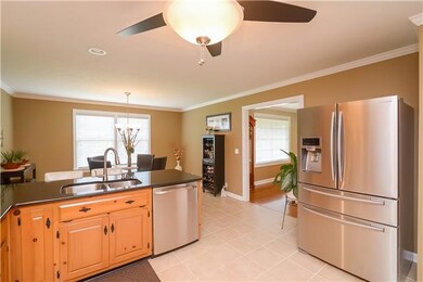 Another view of the kitchen onlooking entry to the dining room area 