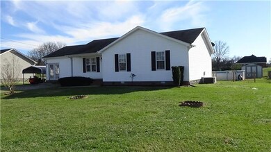 One level, 4 bedroom, 3 full bath, covered front porch, covered screened patio, covered deck in back, open sun deck in back, pool(seller will replace liner or remove for buyer), storage shed, master with walk-in closet and bath.