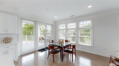 Airy dining area with access to porch!