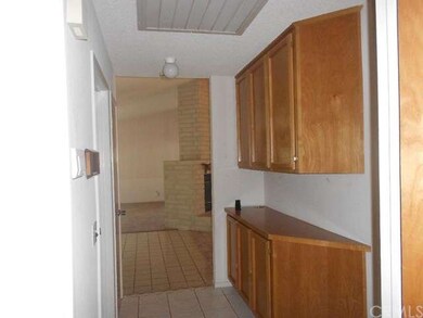 Whole house fan, hall storage, nice tile flooring.