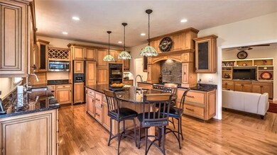Dream Kitchen With Custom Cabinetry & Hardwood