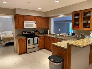 Eat up bar, glass cabinet doors, view to Canal