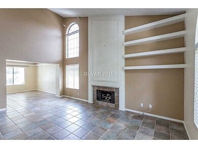 Property Photo. Formal living room opening up to t
