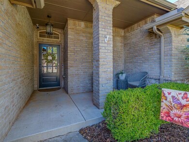 Doorway to property featuring a porch
