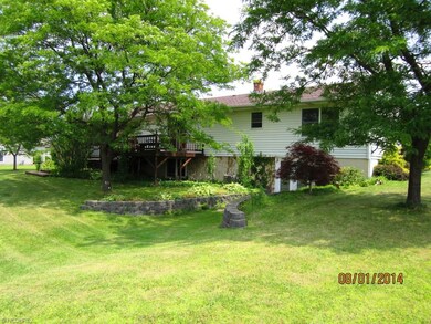 Rear of home showing walkout.