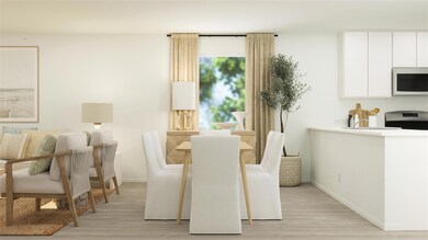 Dining room with light hardwood / wood-style floor