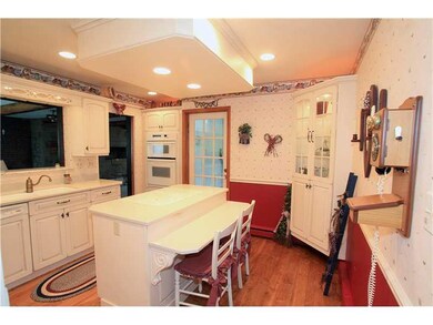 Kitchen. This custom kitchen has a charming countr