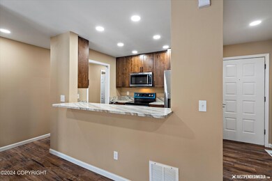 10218 Jamestown Dr unit E, Anchorage, AK 99507 - photo 5