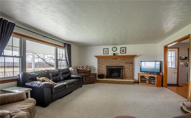 Spacious living room with fireplace.