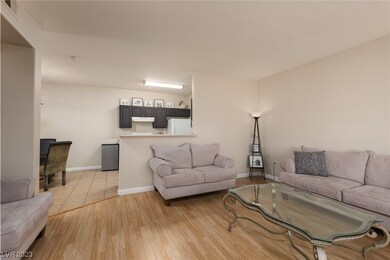The living room, dining room and kitchen are all f