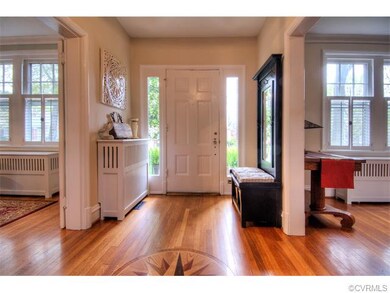 Gorgeous hardwood Foyer with custom inlay artwork