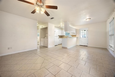 Unfurnished living room with light tile patterned